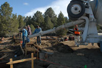 Martin, Ed, and Tractor Pouring the Utility Slab